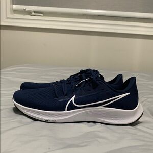 Nike Blue and White Athletic Shoes with Sleek Design